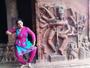 Dr. Manorama BN with the sculpture of Mahanata at Badami